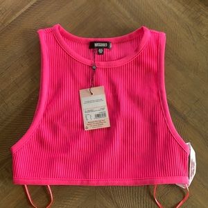 MISSGUIDED hot pink crop top.